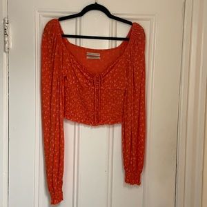 Red floral long sleeved crop top